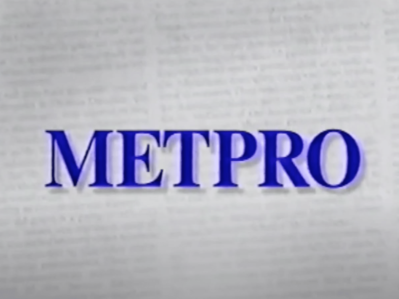 Metpro in all-caps in purple letters on a faded newspaper background.