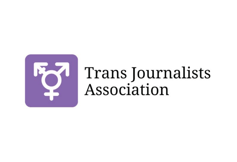 The logo at launch for the Trans Journalists Association — a purple trans symbol with the words Trans Journalists Association.