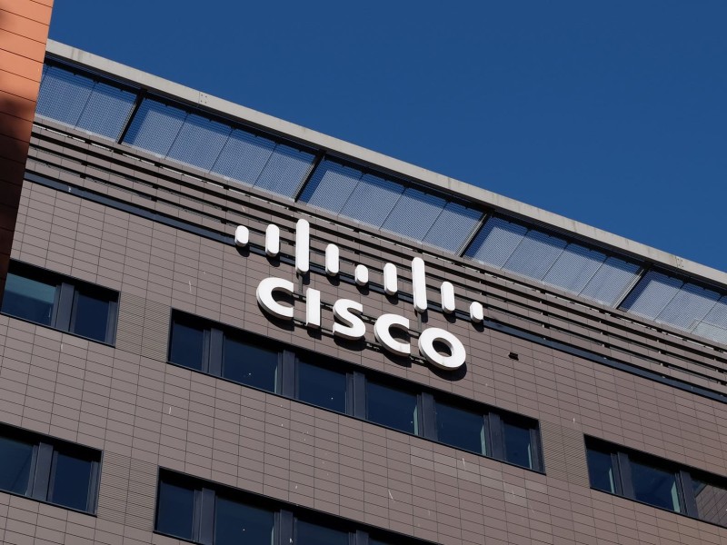 A close-up of the Cisco logo on a company building.