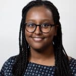 A headshot of Naomi Andu.