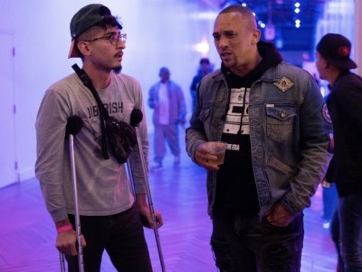 Chazaro, left, interviews musical artist Kev Choice, right.